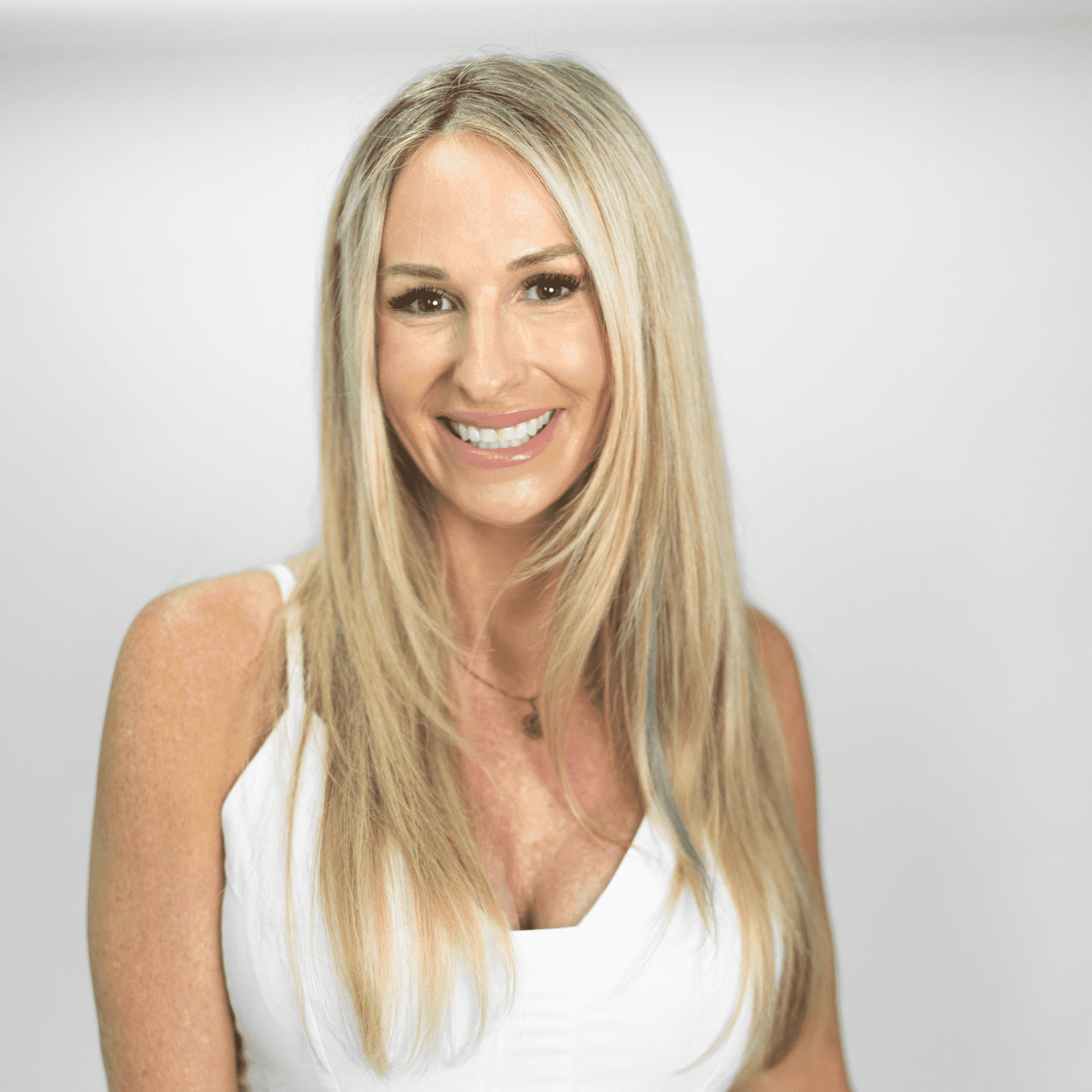Portrait of Kenzie Short, a professional stylist at The Capital Salon & Suites, showcasing their expertise and style.