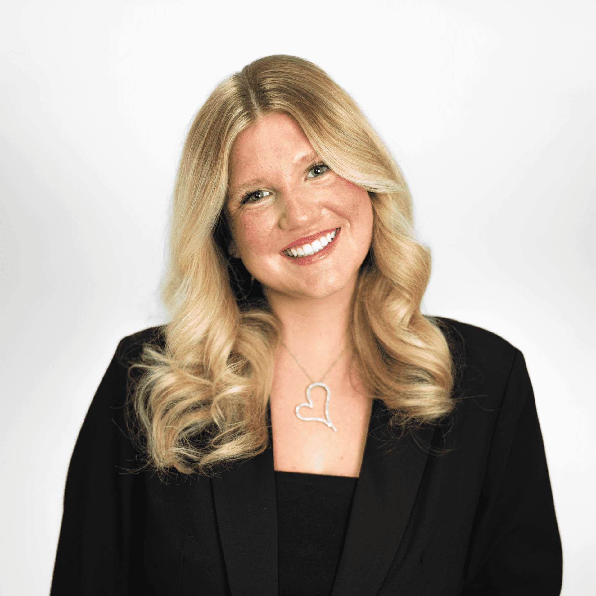 Portrait of Kate Ashworth, a professional stylist at The Capital Salon & Suites, showcasing their expertise and style.