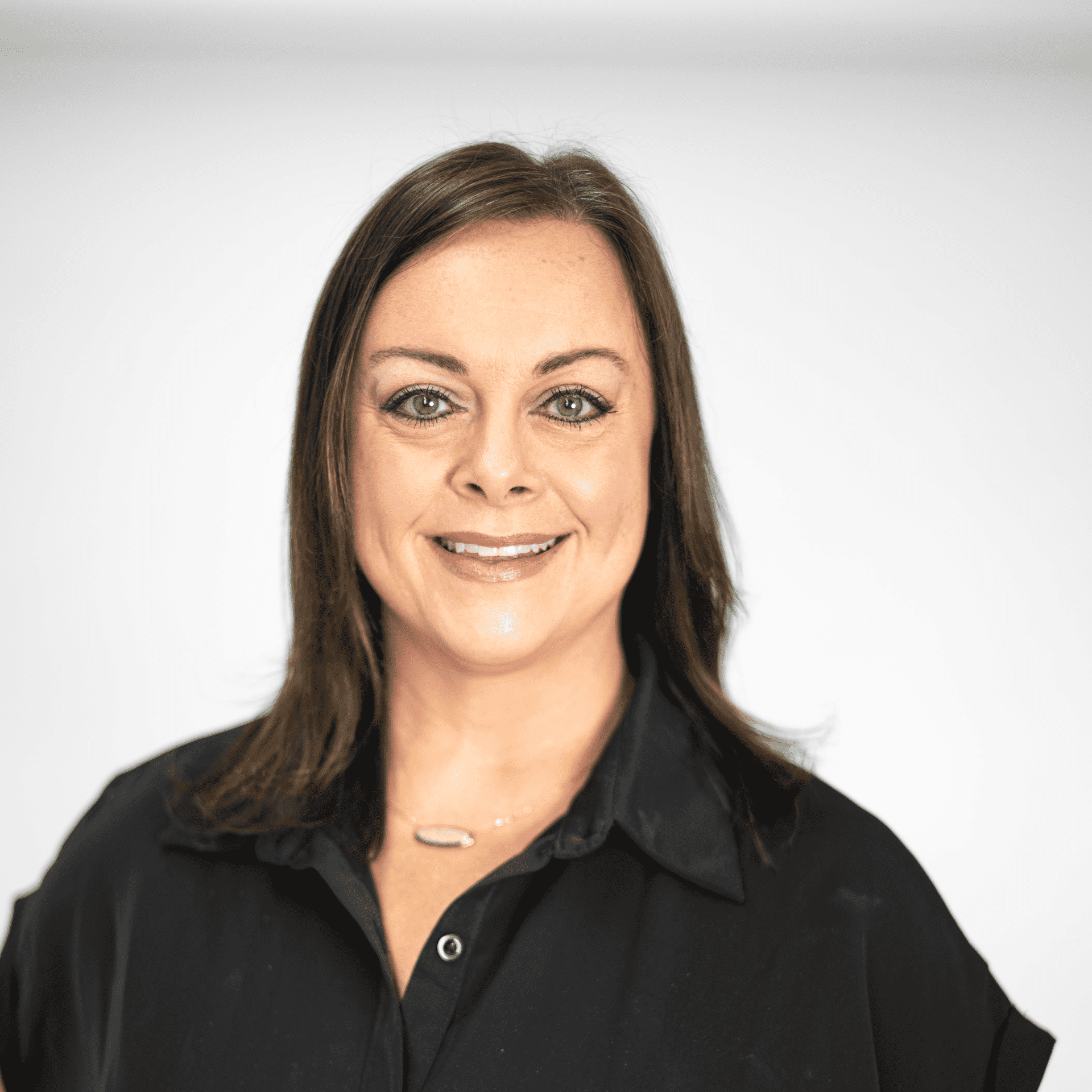 Portrait of Olivia Upton, a professional stylist at The Capital Salon & Suites, showcasing their expertise and style.