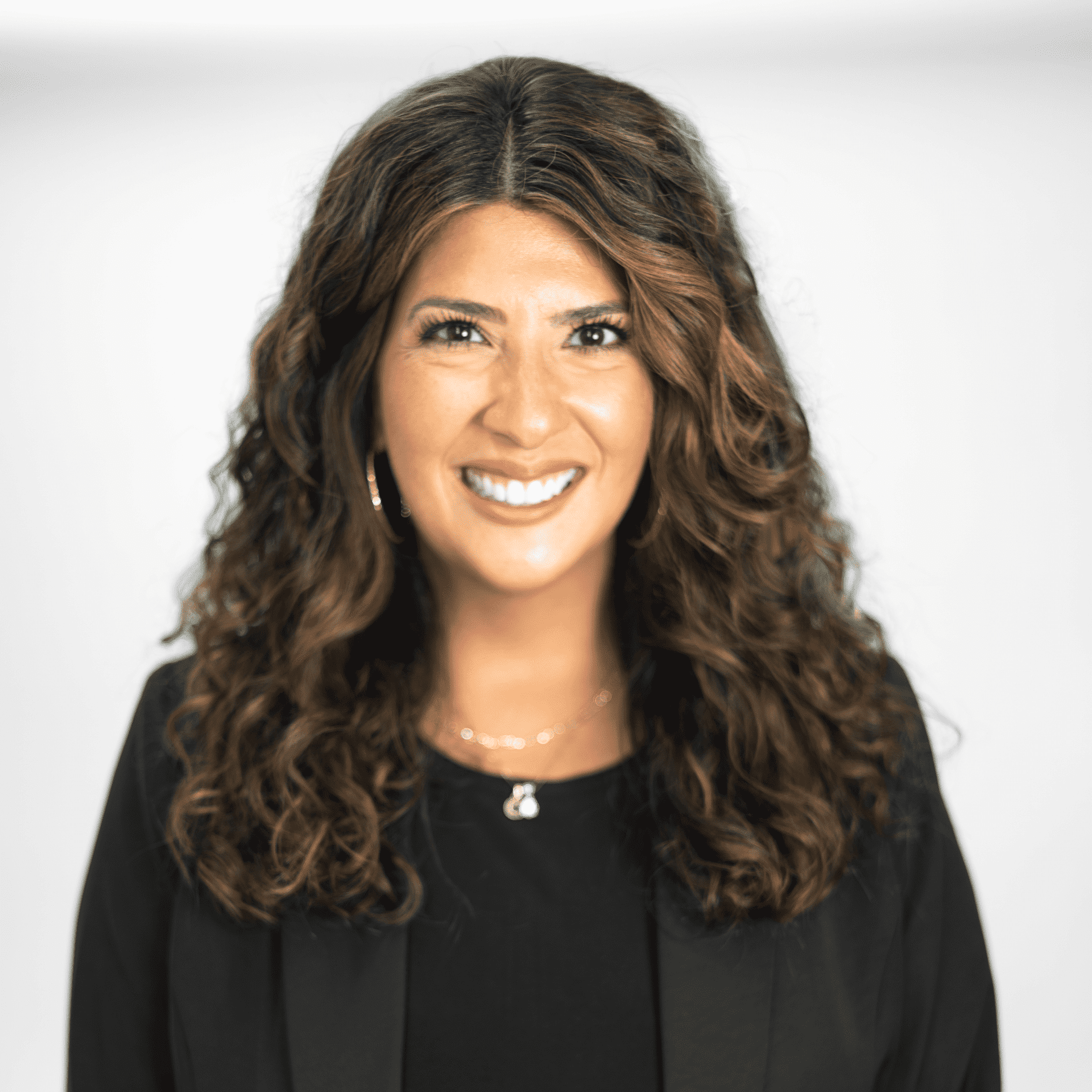 Portrait of Marisa Samavati-Caraway, a professional stylist at The Capital Salon & Suites, showcasing their expertise and style.