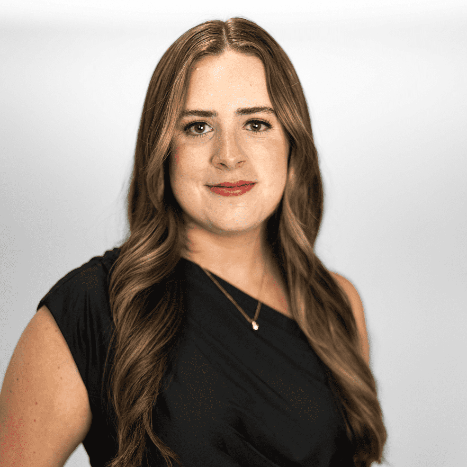 Portrait of Anastasia Franco, a professional stylist at The Capital Salon & Suites, showcasing their expertise and style.