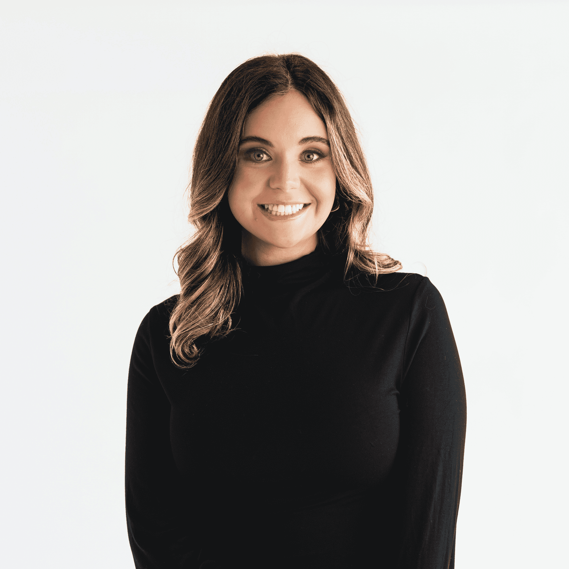 Portrait of Ryleigh Peters, a professional stylist at The Capital Salon & Suites, showcasing their expertise and style.