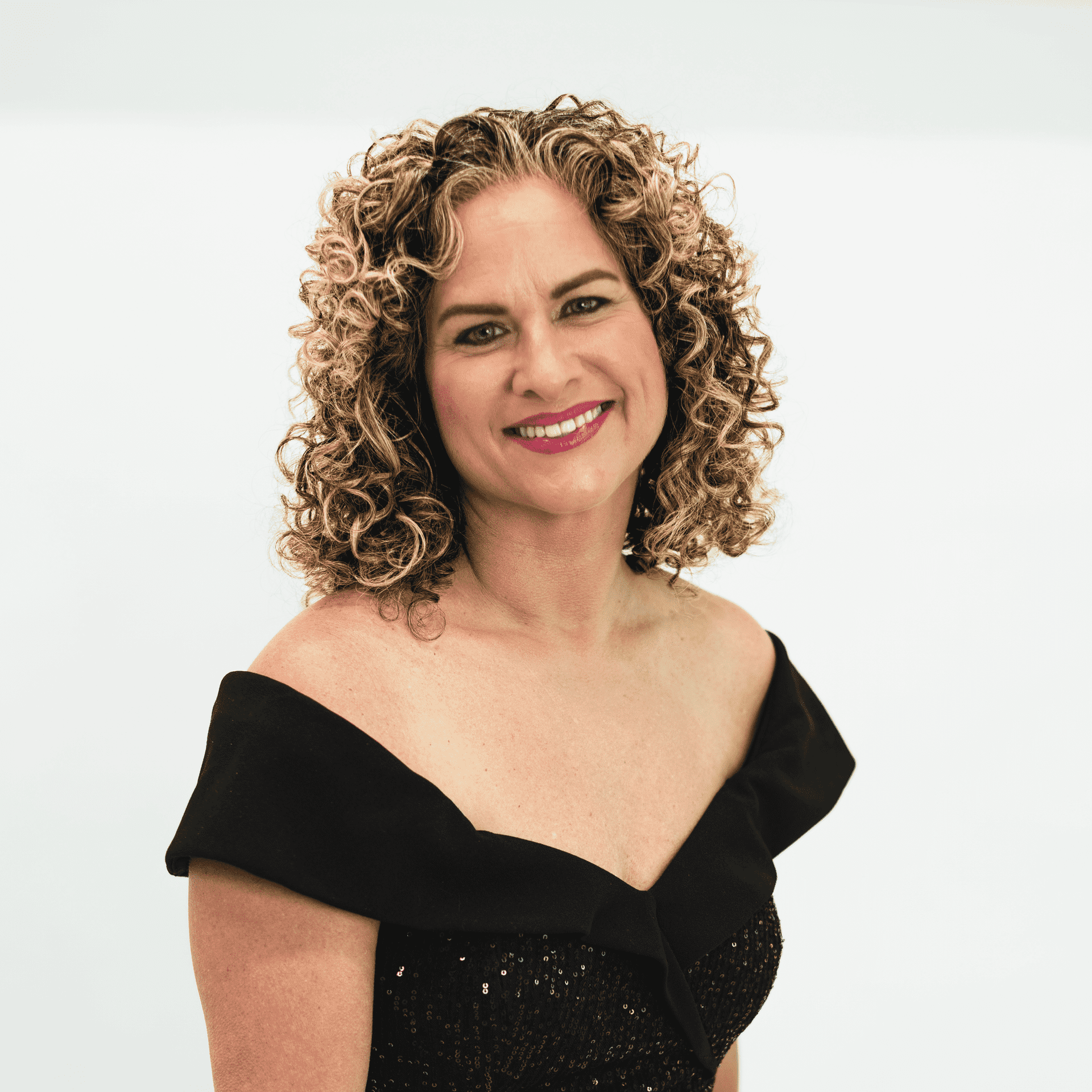 Portrait of Beth Franklin, a professional stylist at The Capital Salon & Suites, showcasing their expertise and style.