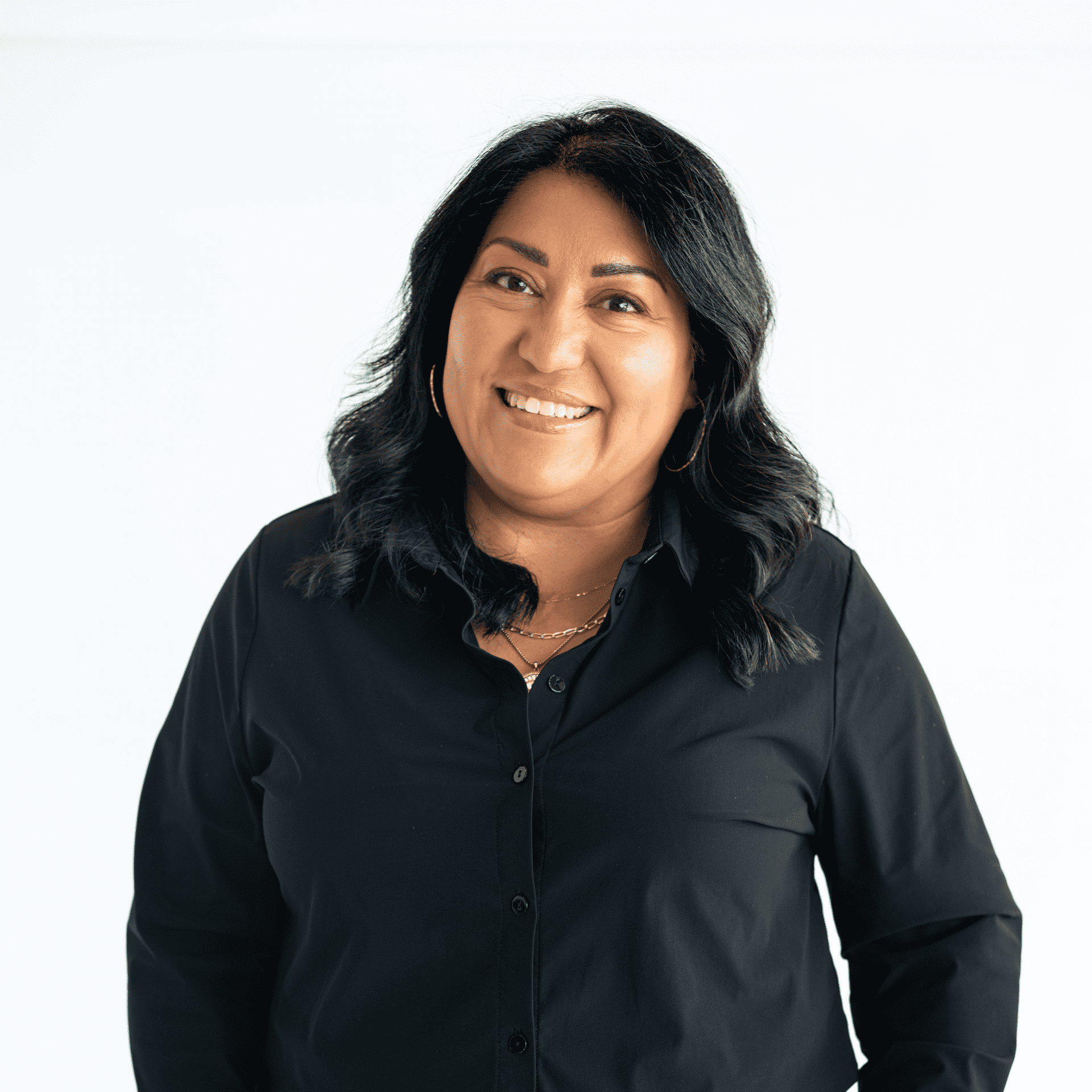 Portrait of Gaby Dobson, a professional stylist at The Capital Salon & Suites, showcasing their expertise and style.