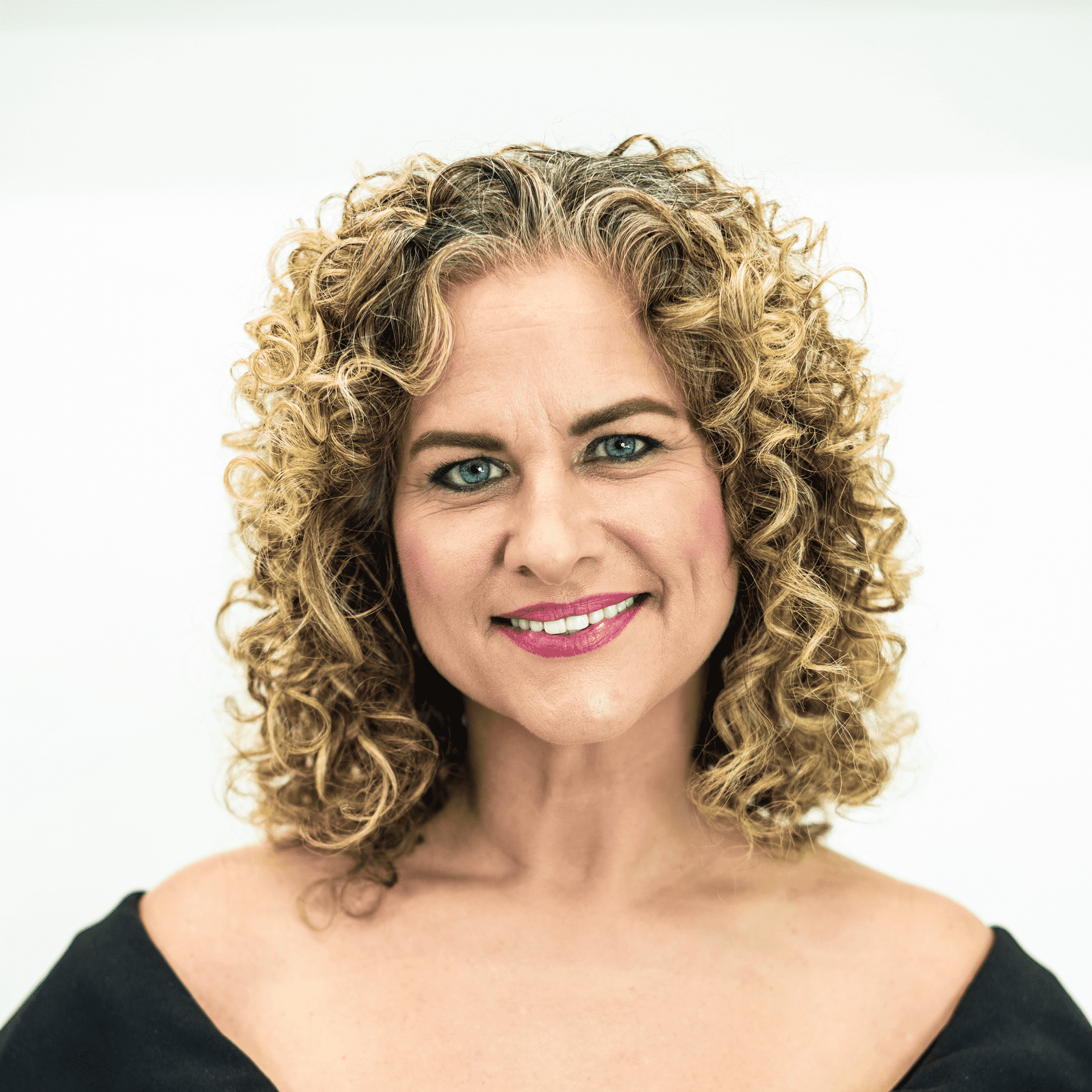 Portrait of Beth Franklin, a professional stylist at The Capital Salon & Suites, showcasing their expertise and style.
