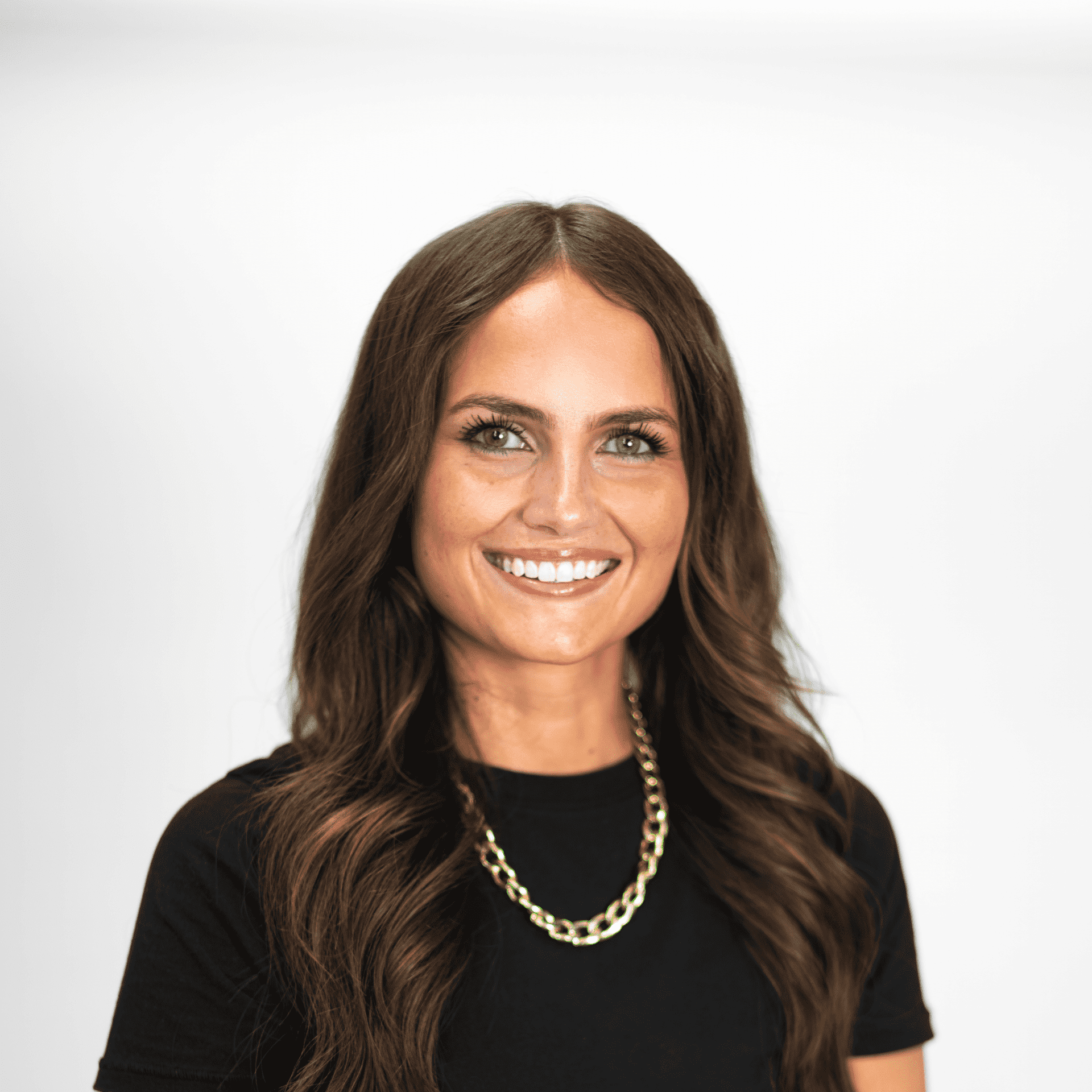 Portrait of Abby Newman, a professional stylist at The Capital Salon & Suites, showcasing their expertise and style.