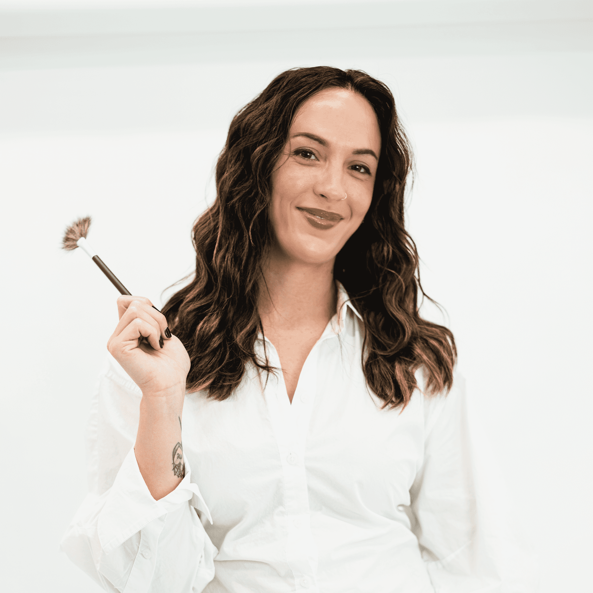Portrait of Allyssa Williamson, a professional stylist at The Capital Salon & Suites, showcasing their expertise and style.