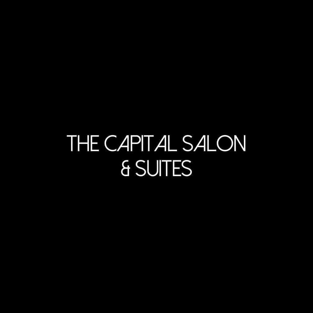Portrait of Cody Renegar, a professional stylist at The Capital Salon & Suites, showcasing their expertise and style.